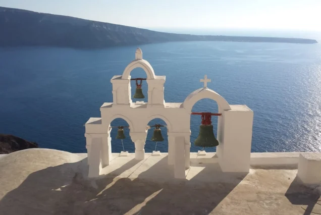 Santorini church bells looking out to sea